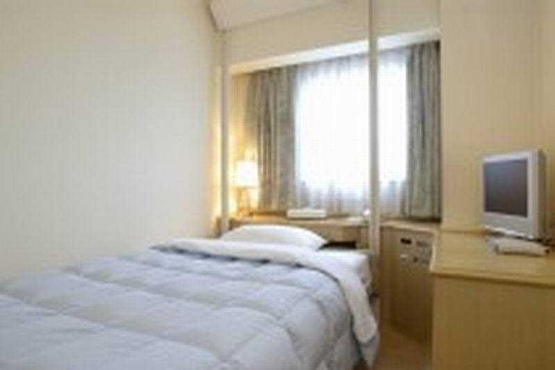 GR Hotel Esaka Suita Habitación foto